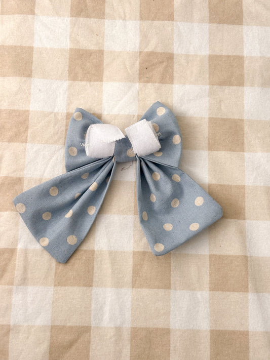 Blue polka dot bow