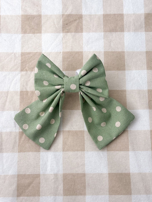 Green polka dot bow