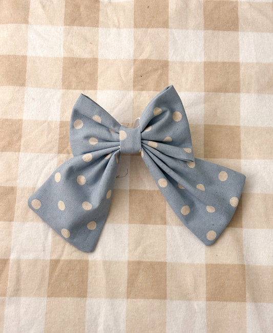Blue polka dot bow